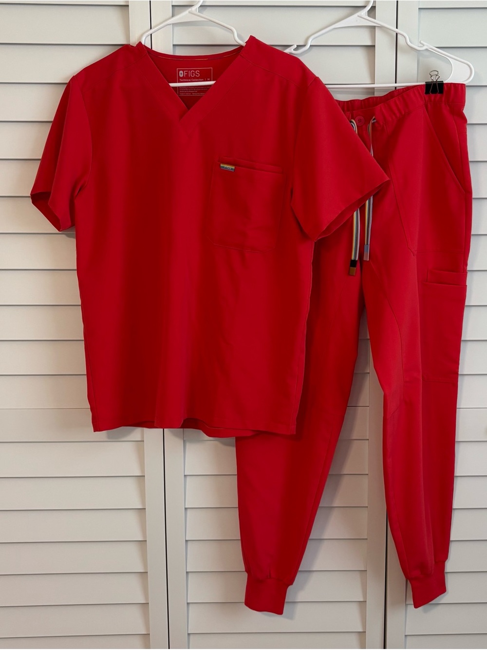 Figs men’s scrub set, medium. Dark coral/red with pride drawstring and tags.